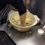 Lisa mixing the dough with her hands